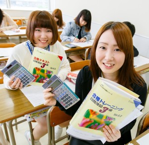 電卓、女子
